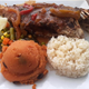 St. Croix potato stuffing, red snapper, and rice on white plate